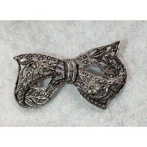 Vintage Silver-Tone Marcasite Bow Brooch Elegant Floral Rhinestone Design 2 Inch